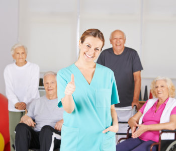 caregiver showing her thumbs up